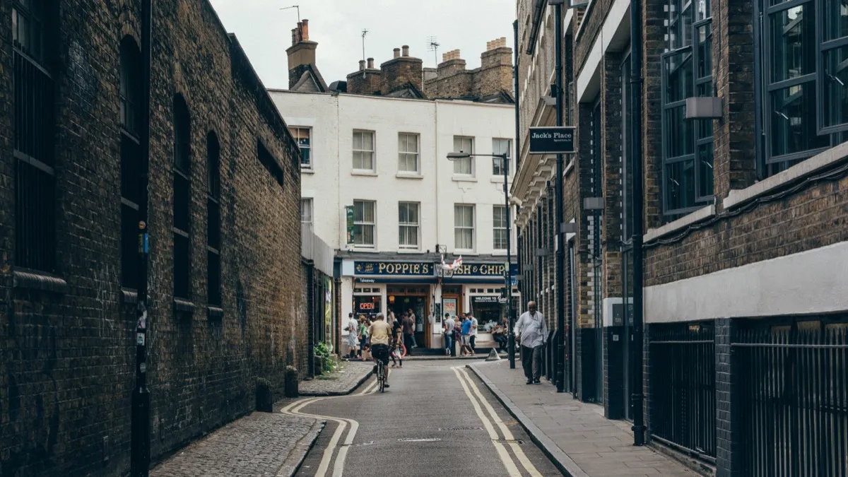 British street scenes with pedestrians and restaurants