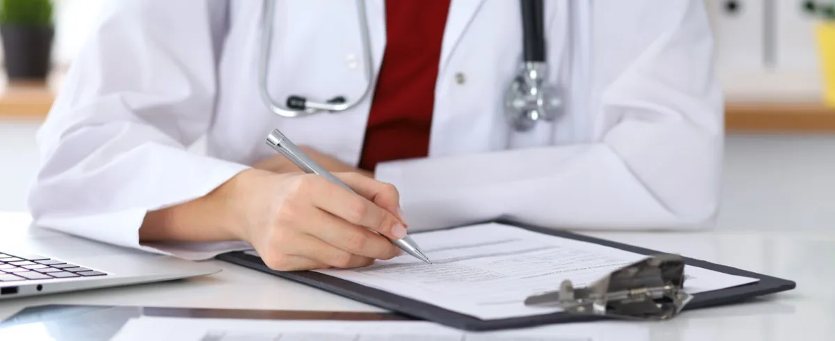 Doctor taking notes