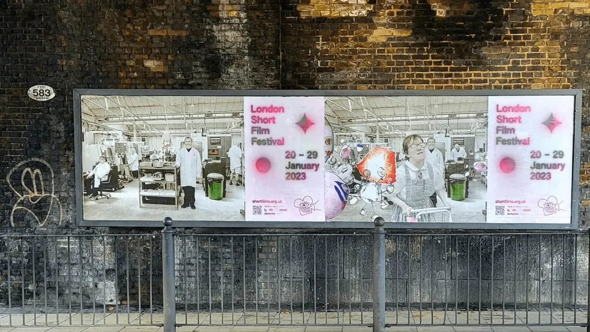 A bulletin board with the London Short Film Festival poster