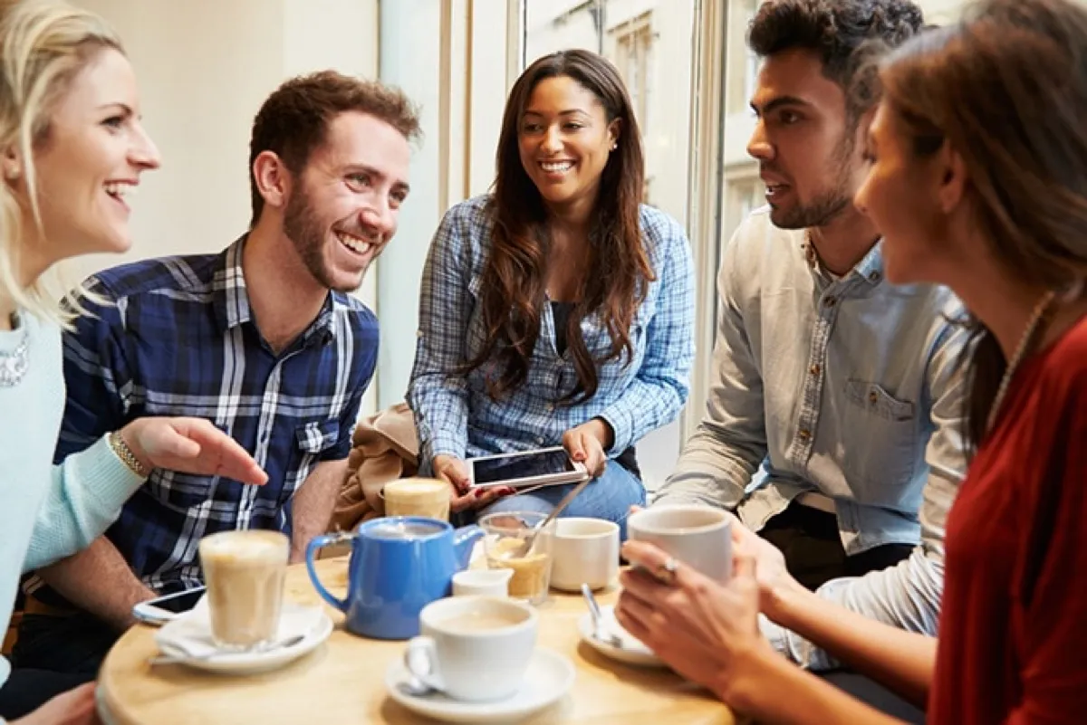 A group of friends having coffee together