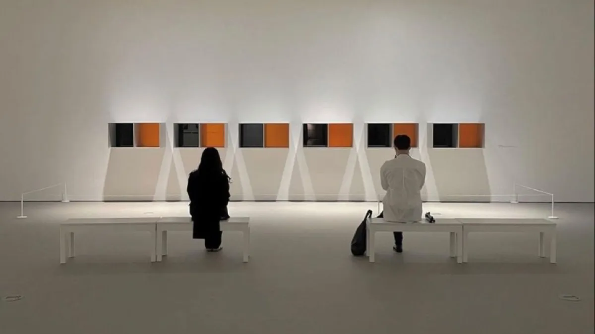 A man and a woman in a museum