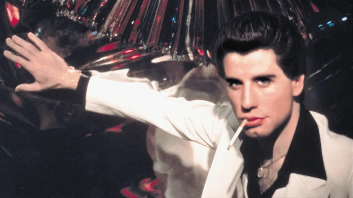 John Travolta in a white suit